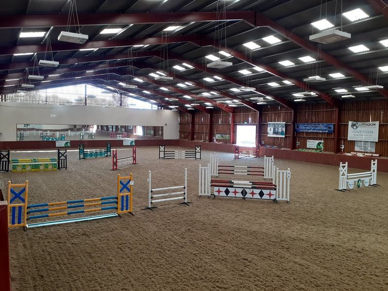 Indoor arena set with a course of show jumps